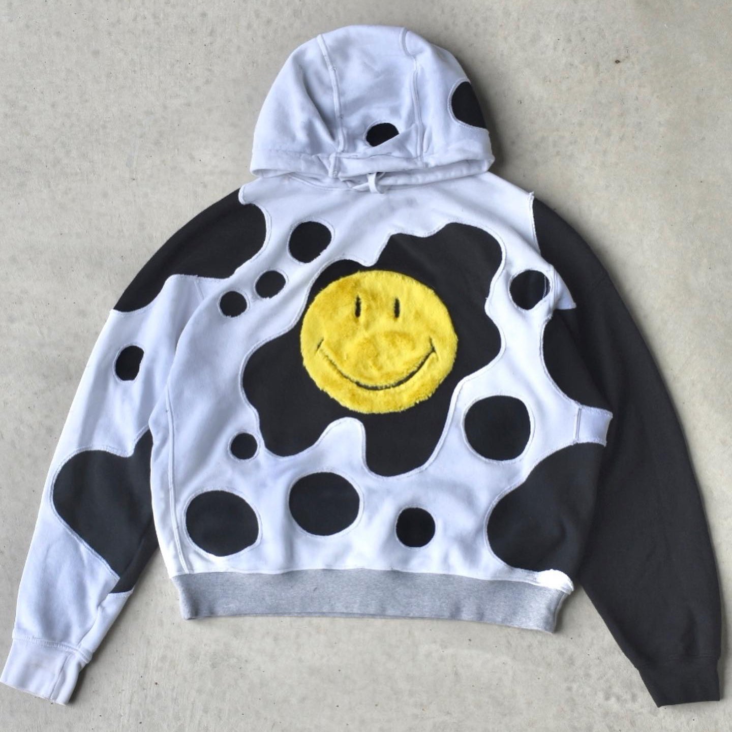 Smiley face patch hoodie