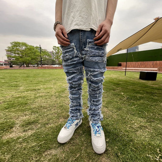 Heavy washed whiskered distressed patch jeans distressed trousers